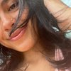 10 Potret Terbaru Eva Celia Saat di Bali, Pamer Rambut Super Kriting dan Tindik Baru di Hidung