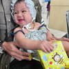 Deretan Potret Imut Baby Bible Kenakan Aksesoris Kepala, Mulai dari Bando Hingga Tudung Menggemaskan