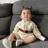 Baby Guzel Diam bak Boneka Hidup yang Cantik, Netizen Malah Salfok sama Jaket Brandednya!