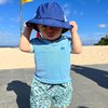 8 Potret Seru Baby Issa saat Main ke Pantai, Langsung Nyemplung Air dan Main Pasir Nih!
