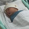 8 Foto Terbaru Baby O Anak Pamela Bowie yang Disebut Mirip Ayahnya Banget