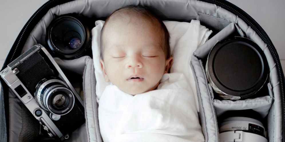 ilustrasi bayi dan kamera