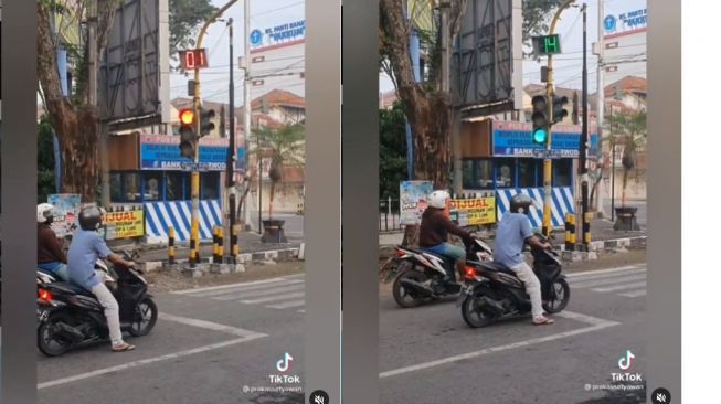 Pemotor kena prank di persimpangan lampu merah