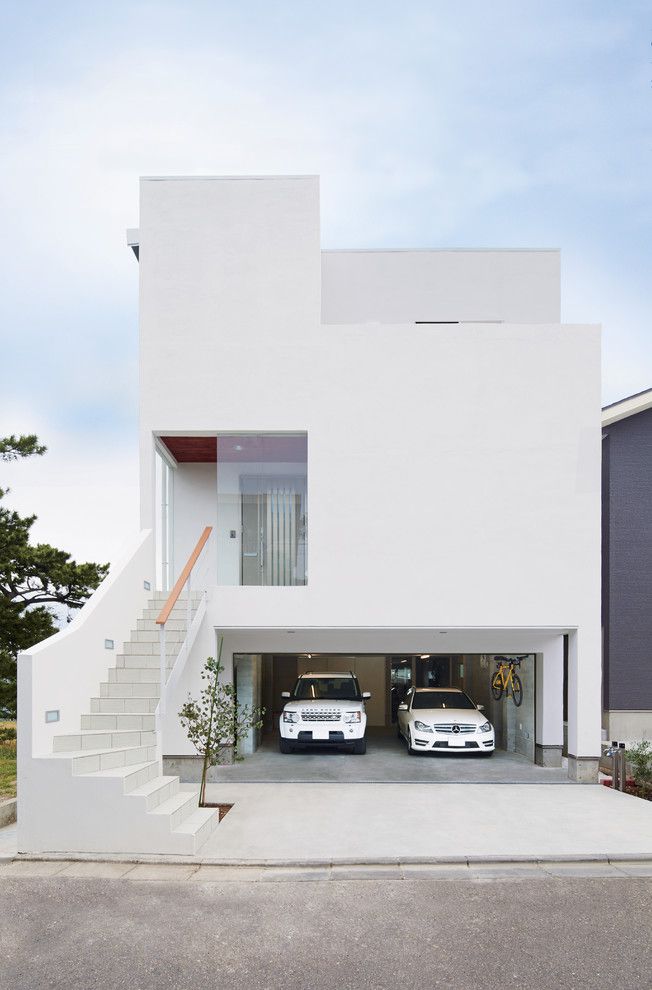 Desain Rumah 2 Lantai Minimalis dengan Garasi di Bagian Bawah