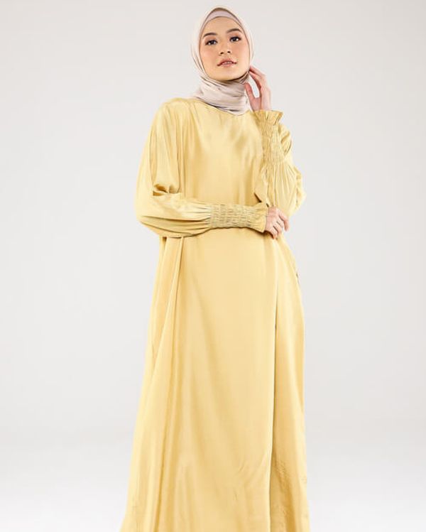 Warna Baju Lebaran Yang Cocok Untuk Kulit Sawo Matang - Kuning