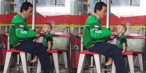 Suapkan Es Krim pada Anaknya, Driver Ojol Ini Membuat Lumer Hati Netizen