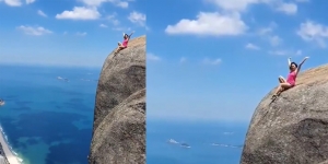 Menantang Maut, Wanita Ini Foto di Pinggir Tebing yang Tinggi Banget