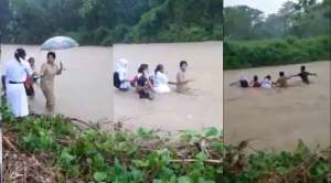 Masih Pakai Seragam, Guru dan Murid Ini Rela Menyeberangi Sungai untuk Sekolah