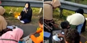 Viral Satu Keluarga Makan di Pinggir Jalan Tol Cipali, Netizen: Dikira Kebun Raya Bogor Kali ya?