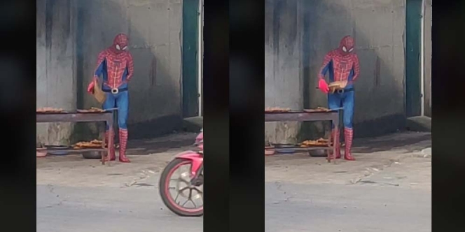 Unik Banget Pria Ini Dagang Sate Pakai Kostum Spiderman, Warganet: Nyate at Home!