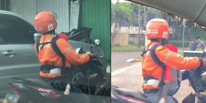 Viral Driver Ojol Antar Makanan sambil Gendong Anak Kemana-mana, Bikin Haru