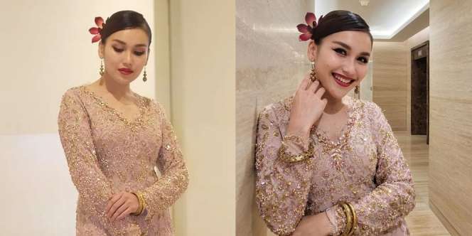 Potret Ayu Ting Ting dengan Baju Melayu yang Terlihat Anggun, Lipstik Merahnya Nyala Banget!