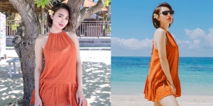 Makin Terlihat Manis dengan Bunga di Telinga, Ini Deretan Potret Wika Salim Liburan di Pantai dengan Sundress Orange