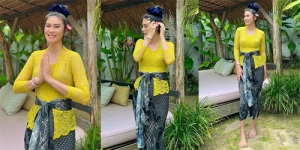Tak Pakai Hijab, Ini Deretan Potret Stevie Agnecya Tampil Cantik dengan Kebaya Kuning Cerah Khas Bali