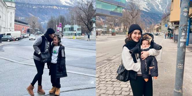 Potret Ayu Ting Ting Liburan Ke Austria, Sambil Gendong Ponakan di Tengah Suhu 4 Derajat