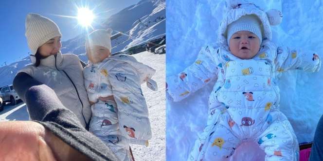 Potret Gemasnya Baby Nae Anak Adipati Dolken saat Pertama Kali Bermain Salju, Cute Kayak Boneka Banget!
